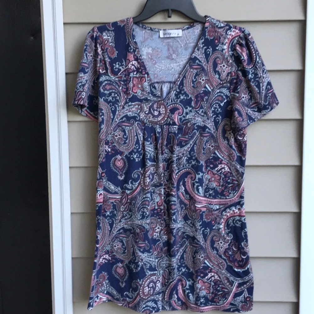 Navy blue background with burgundy, blush pink, and white paisley pattern.